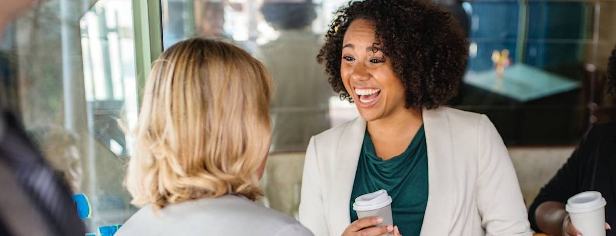 women at casual business meeting