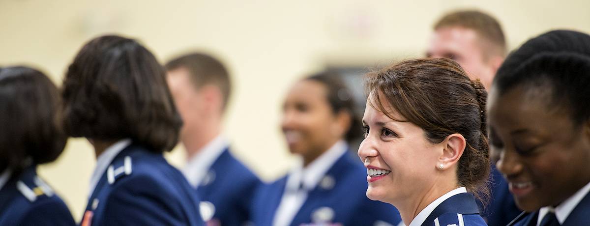 Woman smiling in crowd