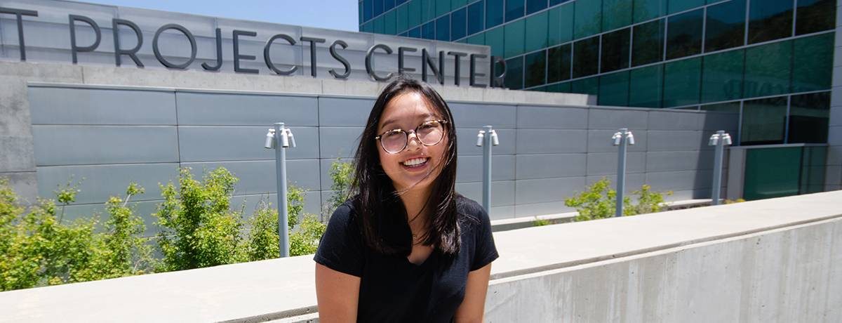 Young lady smiling outside science centre